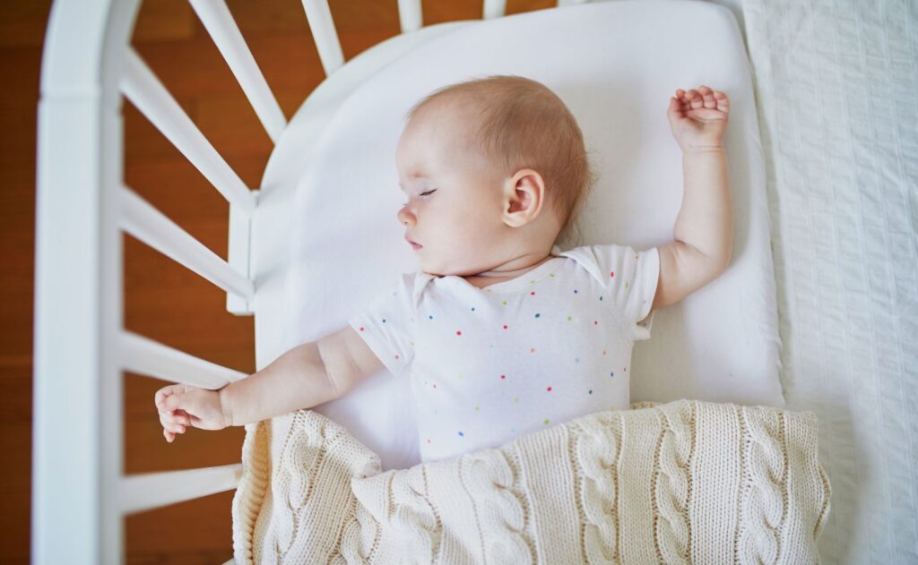 Baby sleeping in crib